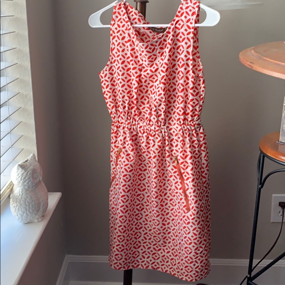 Red and white dress with gold zip pockets. M